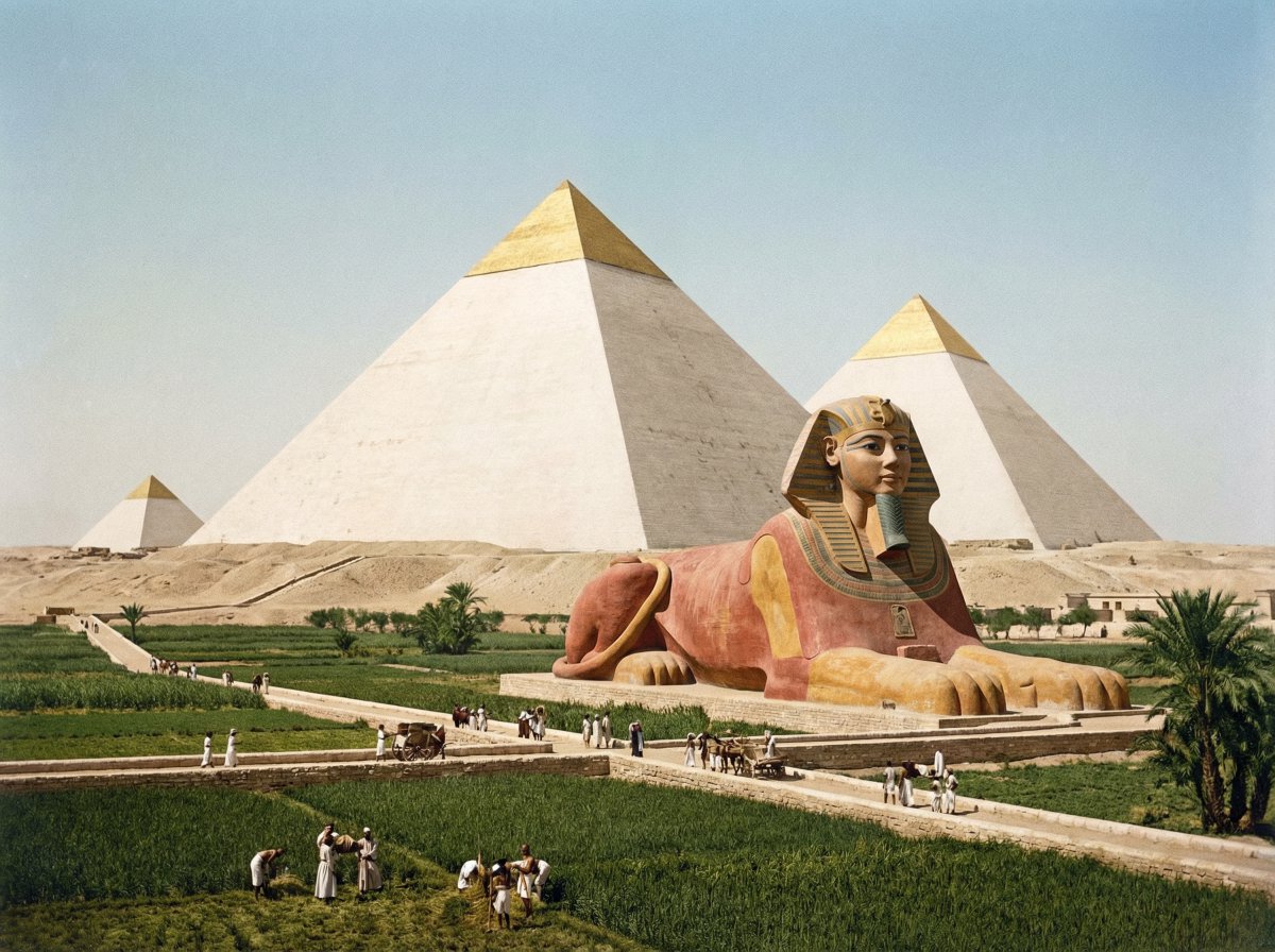 a photo of the pyramids and sphinx, but how they looked when they were origin...