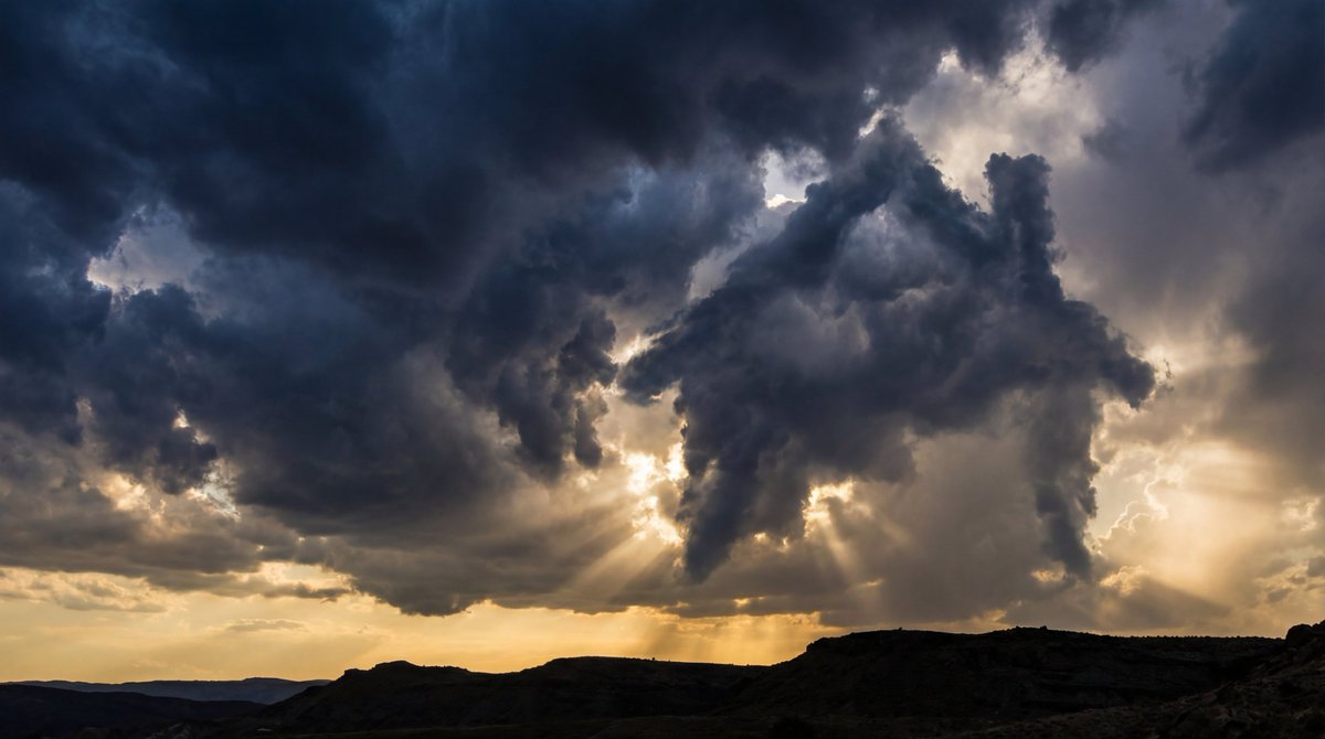 A dramatic sky photo where swirling storm clouds